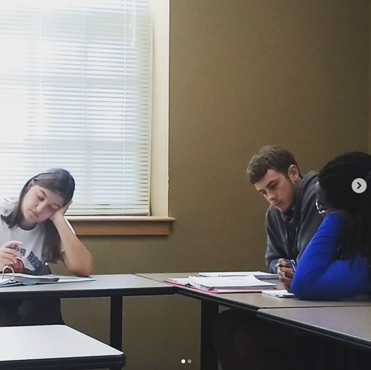 Students writing creatively in Spanish