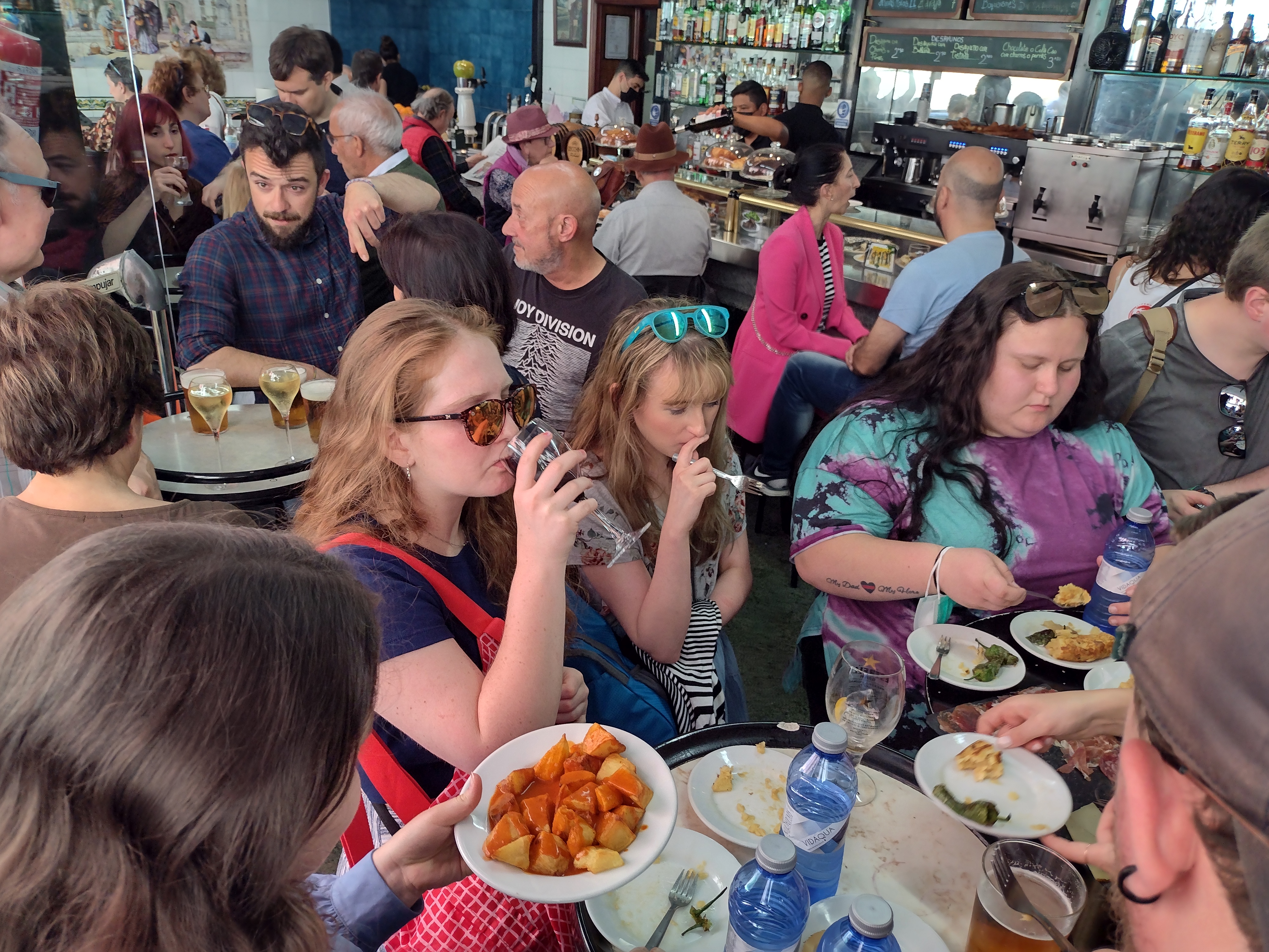 Students eating tapas